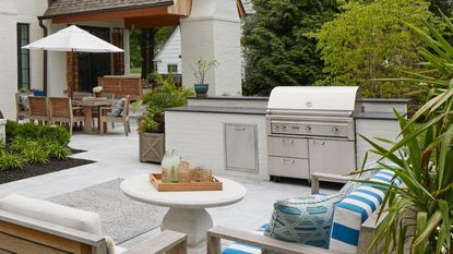 A backyard barbecue and socializing area