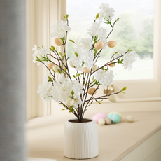 Three next easter egg trees next to each other.