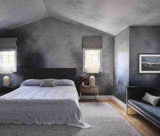 A bedroom with distressed walls