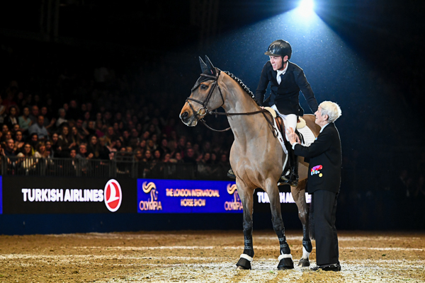 Scott Brash riding Ursula, with Lady Harris on the retirement of Ursula during the Olympia, The London International Horse Show held at Olympia in London in the UK between 17 - 23 December 2018