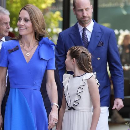 Prince William wearing crisp white Wimbledon pants