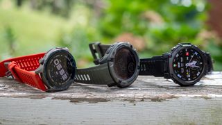 An Amazfit Balance 2, Amazfit T-Rex 3 Pro, and Garmin Instinct 2X Solar smartwatch