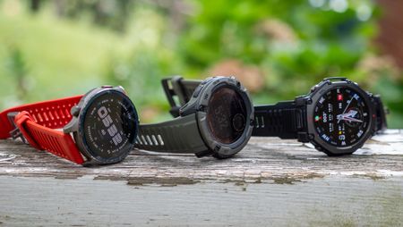 An Amazfit Balance 2, Amazfit T-Rex 3 Pro, and Garmin Instinct 2X Solar smartwatch