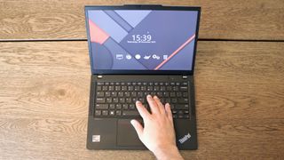 ThinkPad X13 Gen 4 hand on keyboard