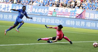 Obafemi Martins scores a goal for Shanghai Shenhua against Shanghai SIPG in May 2017.