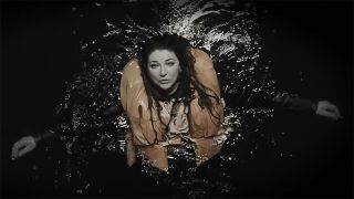 Kate Bush in her And Dream Of Sheep video