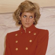 Diana, Princess of Wales (1961 - 1997) wearing a red suit by Catherine Walker during a visit to Pudsey in West Yorkshire, UK, July 1989. (Photo by Princess Diana Archive/Getty Images)