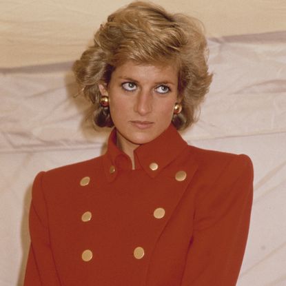 Diana, Princess of Wales (1961 - 1997) wearing a red suit by Catherine Walker during a visit to Pudsey in West Yorkshire, UK, July 1989. (Photo by Princess Diana Archive/Getty Images)