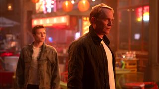 Paul Bettany as human Vision and Ruaridh Mollica as Tommy Shepherd/Speed in Madripoor in VisionQuest