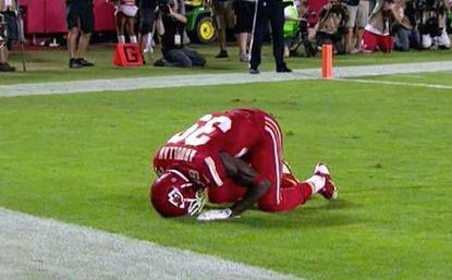 Football referees penalize Muslim player for post-touchdown prayer