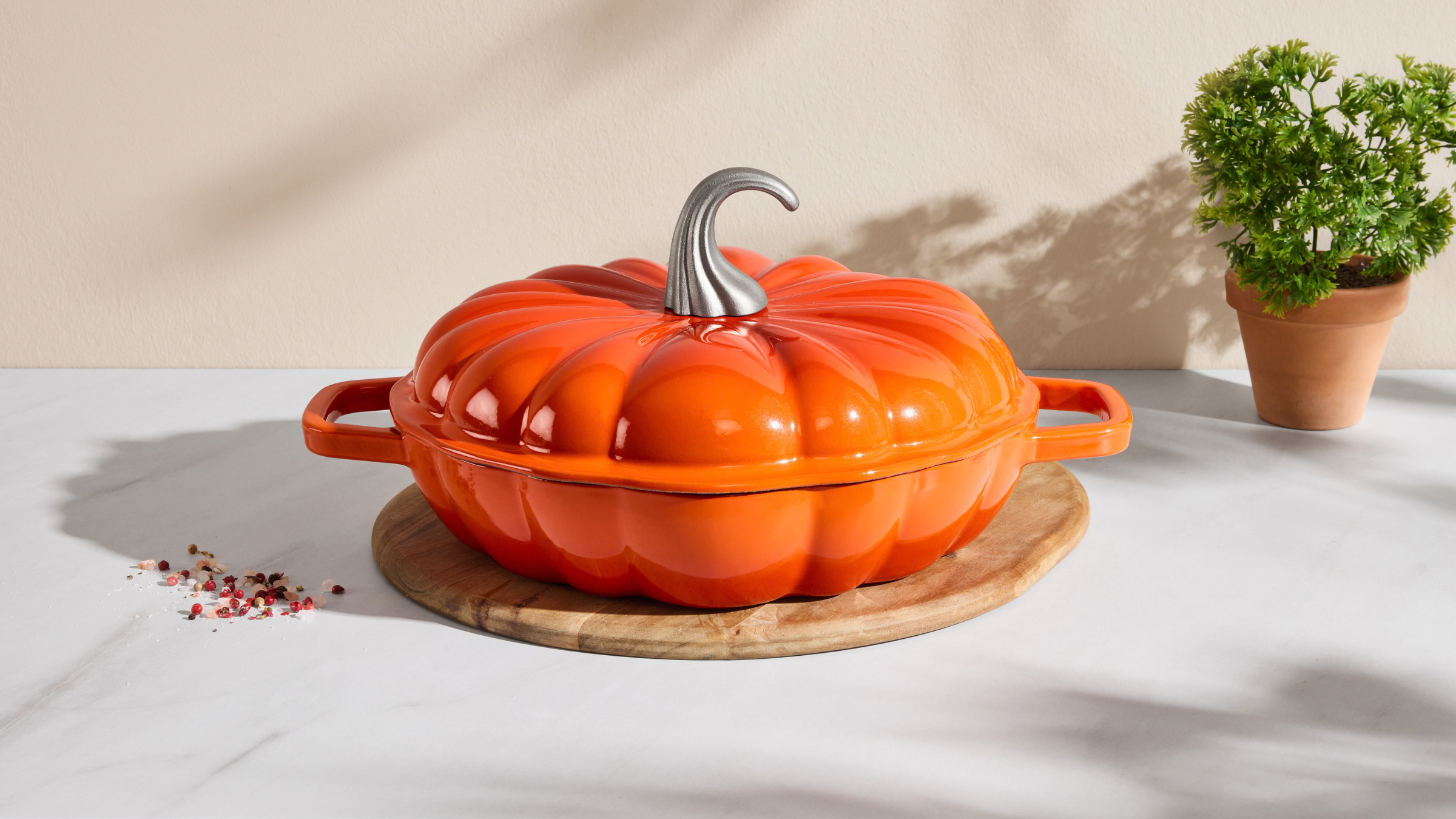 Lidl Pumpkin cast iron casserole on kitchen worktop.