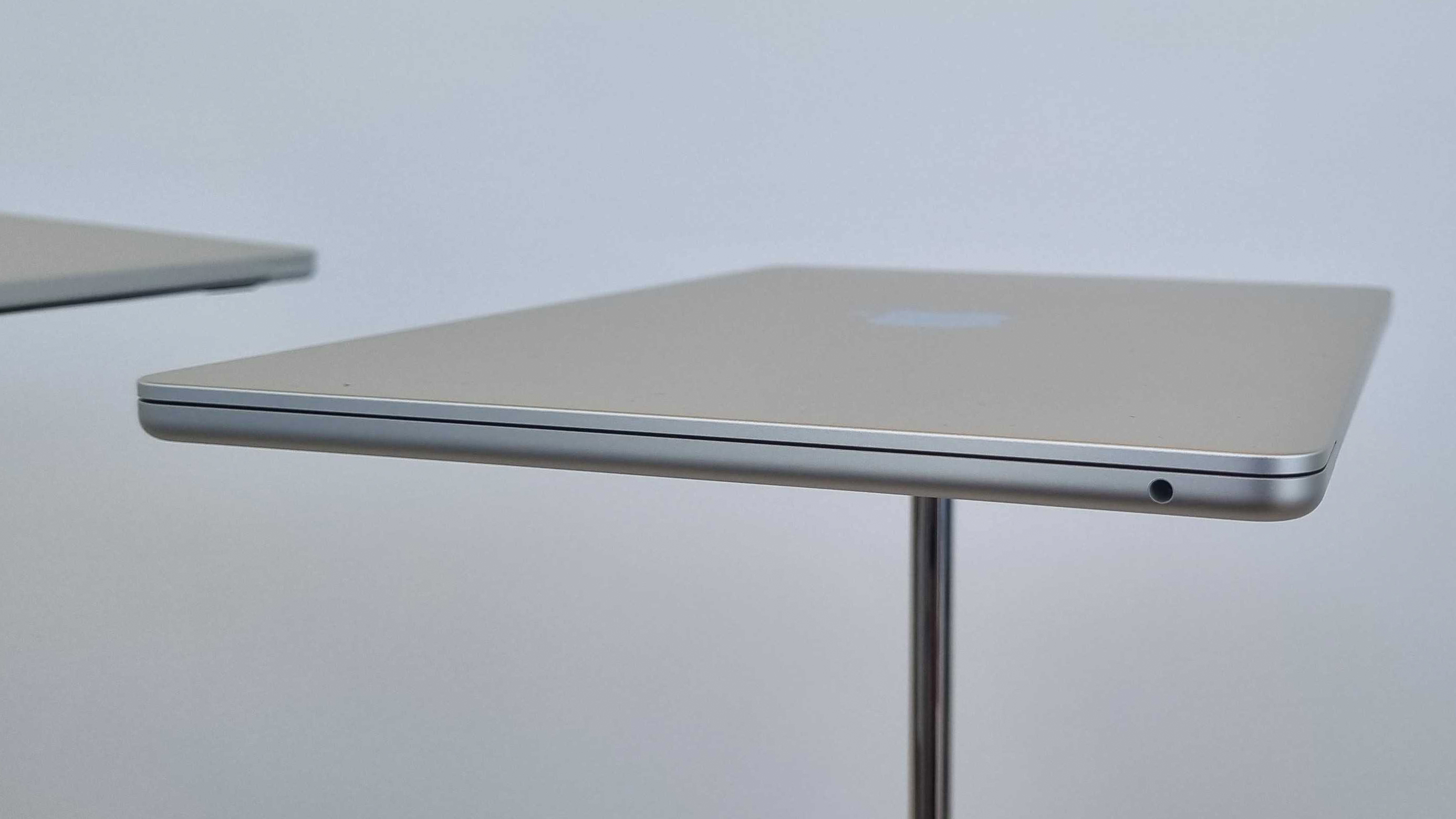 The Apple MacBook Air 2022 laptop on a stand