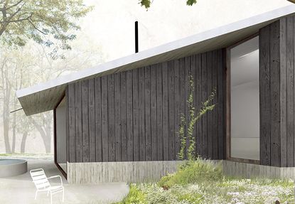 External view of a building with a sloped roof and dark wooden panelling