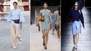 Three female models walking down the catwalk wearing powder blue