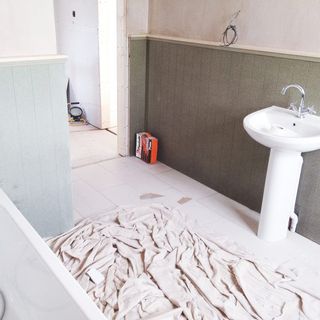 washroom with white washbasin
