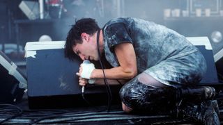 Trent Reznor performing with Nine Inch Nails at Lollapalooza in Waterloo, New Jersey on August 14, 1991.