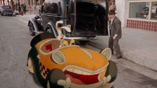 Benny looks exasperated as Roger and Eddie prepare to make a getaway in Who Framed Roger Rabbit.