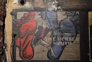 Vintage film poster for 1950s British satirical comedy The Horseâ€™s Mouth. Photo taken in a disused passageway of Notting Hill Gate station by Mike Ashworth of London Underground.
