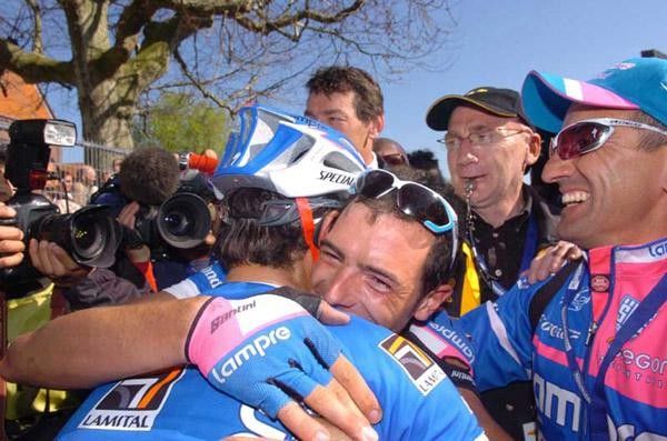 Ballan gets a big hug from his team-mates
