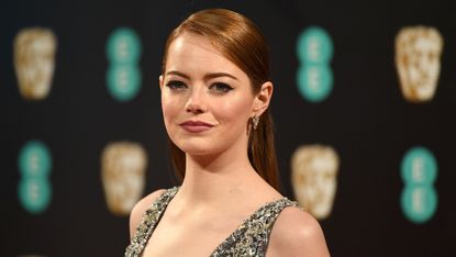 US actress Emma Stone poses upon arrival at the BAFTA British Academy Film Awards at the Royal Albert Hall in London on February 12, 2017. / AFP / Justin TALLIS(Photo credit should read JUSTI