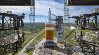 The Mobile Service Tower rolls back from the United Launch Alliance's Delta IV Heavy rocket carrying the NROL-44 mission for the National Reconnaissance Office, in preparation for launch from Space Launch Complex-37 at Cape Canaveral Space Force Station, Florida, on Dec. 10, 2020.