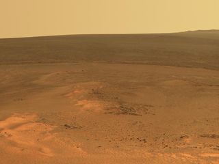 NASA's Opportunity Mars rover took this mosaic of images with its panoramic camera in mid-January 2012. It shows the windswept vista northward (left) to northeastward (right) from the location where Opportunity is spending its fifth Martian winter, an outcrop informally named "Greeley Haven."
