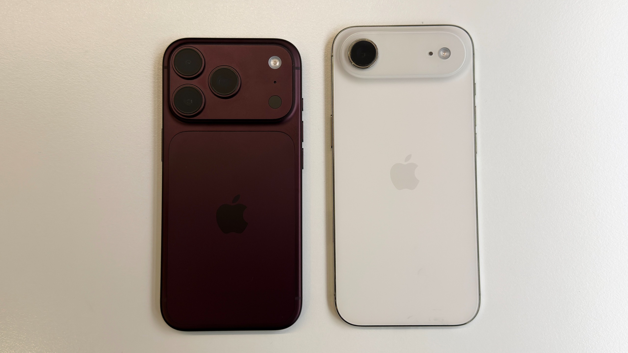 The iPhone 18 Pro and iPhone Air resting on a white table