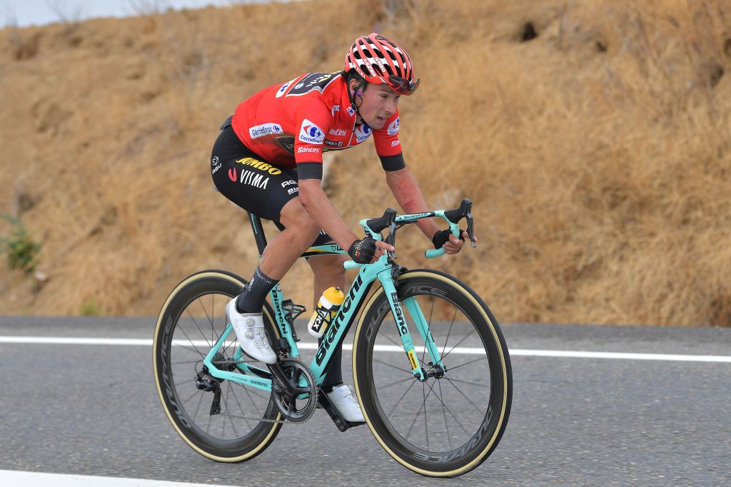Primoz Roglic (Jumbo-Visma) chases after the crash on stage 19