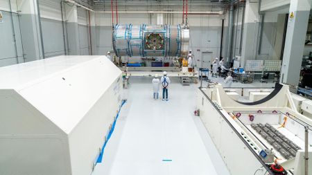 Technicians at Thales Alenia Space in Turin, Italy prepare the HALO habitat module for transport to the United States.