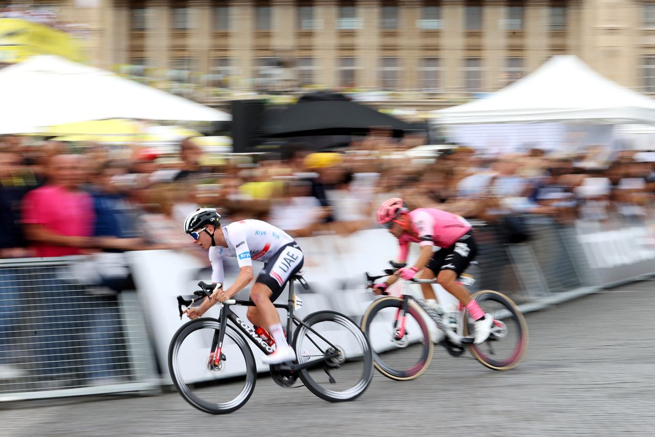 Tadej pogacar and Alberto Bettiol attacking on stage 21 of the tour de france