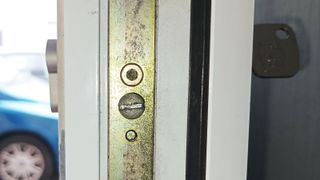 Close up of edge of UPVC door lock