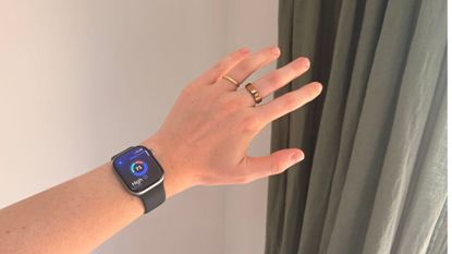 Grace Walsh wearing the Apple Watch Series 11 and the Oura Ring 5 on the same hand