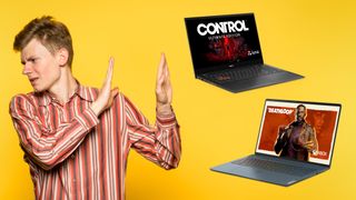 A man in a striped shirt raising his hands up to a pair of gaming Chromebooks from Asus and Lenovo, as if to say 'No thank you'.