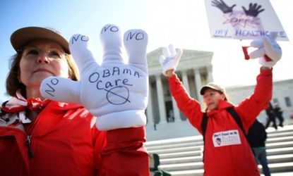 More than half of Americans disapprove of President Obama's health-care overhaul, which may be struck down by the Supreme Court on Thursday.