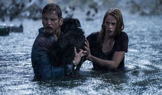 Crawl Barry Pepper and Kaya Scodelario rescue an animal during a hurricane