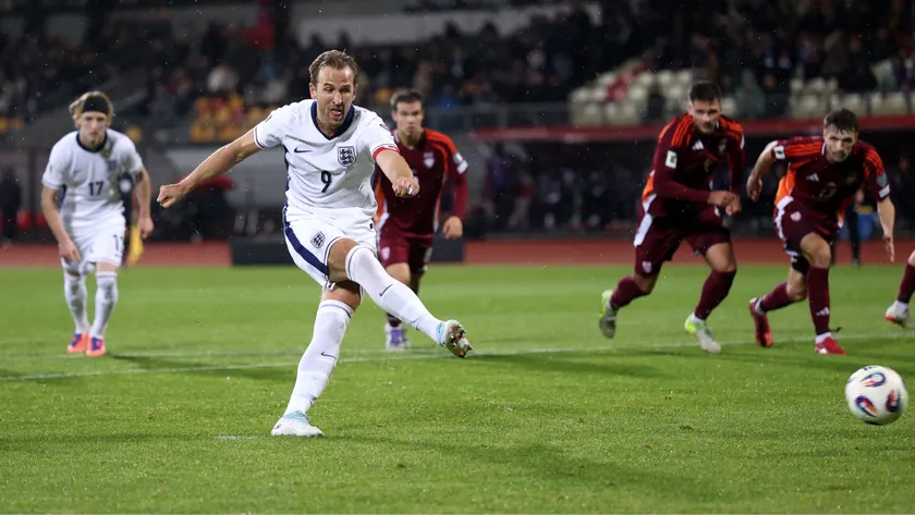 Harry Kane of England scores a penalty for his team&#039;s third goal during the FIFA World Cup 2026 qualifier match between Latvia and England at Daugava Stadium on October 14, 2025 in Riga, Latvia.