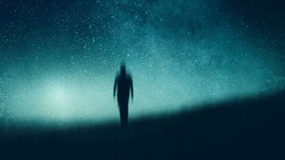 An atmospheric, moody concept of a figure walking towards the camera silhouetted against the night sky. With an abstract, artistic edit.
