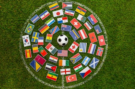 Flags around a football