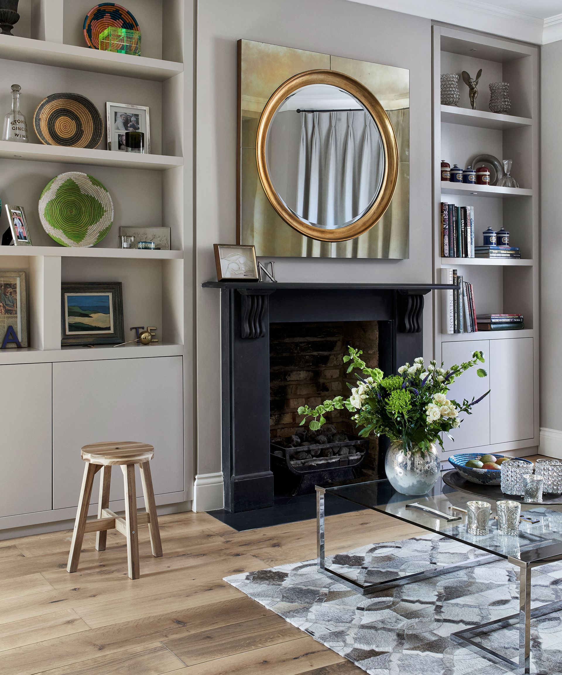 Living room layout ideas with shelving and fireplace