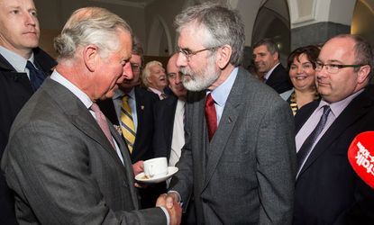 Prince Charles shakes Gerry Adams' hand