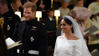 britains prince harry, duke of sussex, l and us fiancee of britains prince harry meghan markle arrive at the high altar for their wedding ceremony in st georges chapel, windsor castle, in windsor, on may 19, 2018 photo by jonathan brady pool afp photo credit should read jonathan bradyafp via getty images