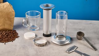 a glass AeroPress premium with aluminum flourishes 