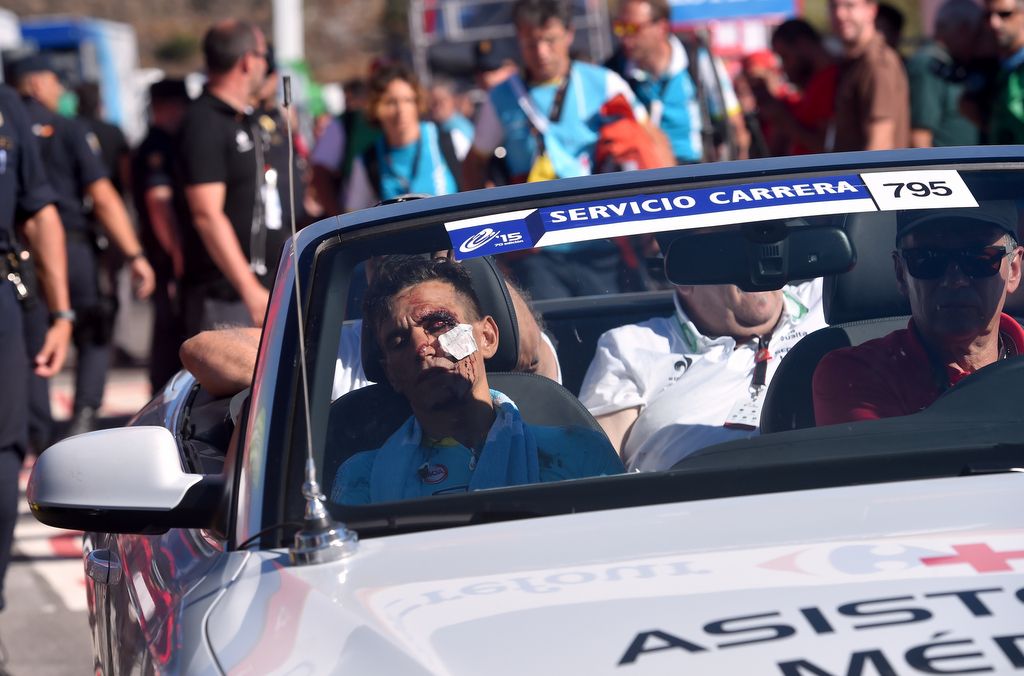 Paolo Tiralongo looking worse for after after crashing heavily on his face, is taken away post-stage in the medical vehicle
