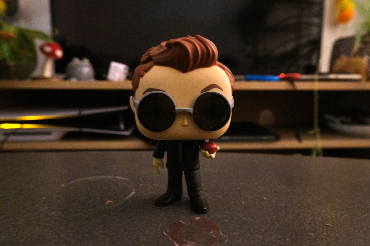 A Funko Pop figure of Crowley from Good Omens, taken on a Fujifilm X-M5 mirrorless vlogging camera