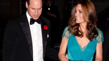 Prince William puts a hand on the small of Kate Middleton&#039;s back at a gala