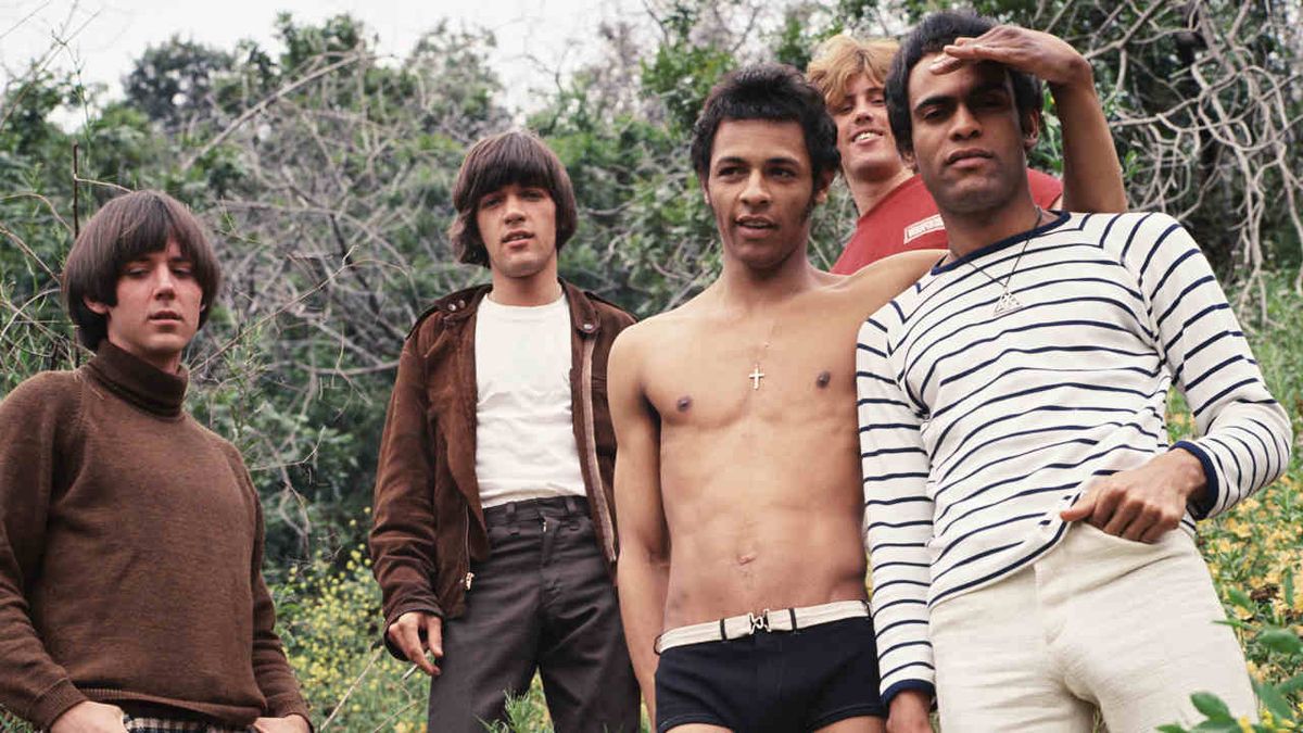 Love posing for a photograph in tall grass in the late 1960s