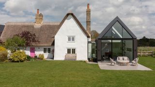 A double-height extension has taken Steph and Tom Murray’s 400-year-old Cambridgeshire cottage to another level