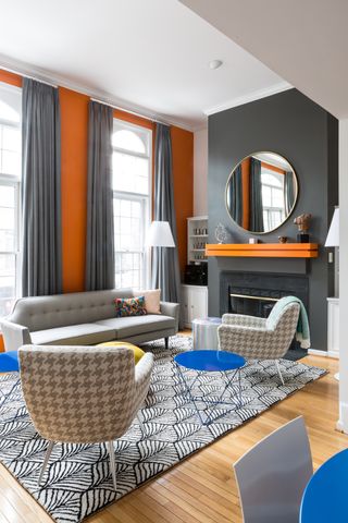 A living room with thick, gray curtains