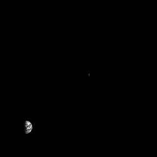 A black and white view of Earth and moon.