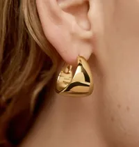 Tapered Large Hoop Earrings: was £199, now £139.30 (save 30%) Tapered Large Hoop Earrings: was £199, now £139.30 (save 30%)